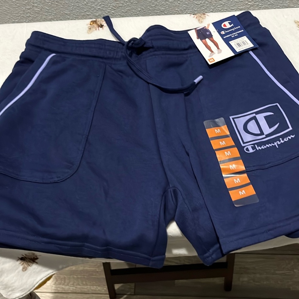 Champion athletic wear l blue size medium be a  champion